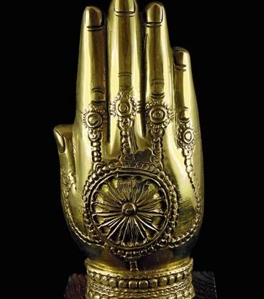 main en bronze avec ganesh