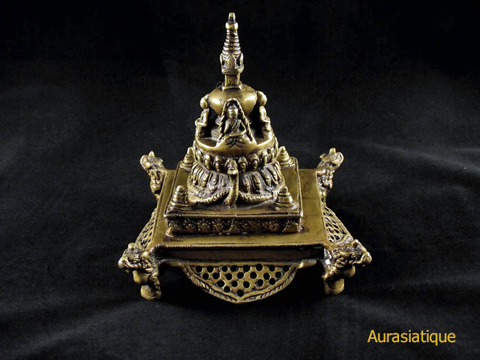 stupa en bronze aux quatre bouddha