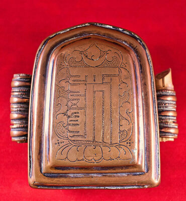 ghau tibétain avec signe du kalachakra